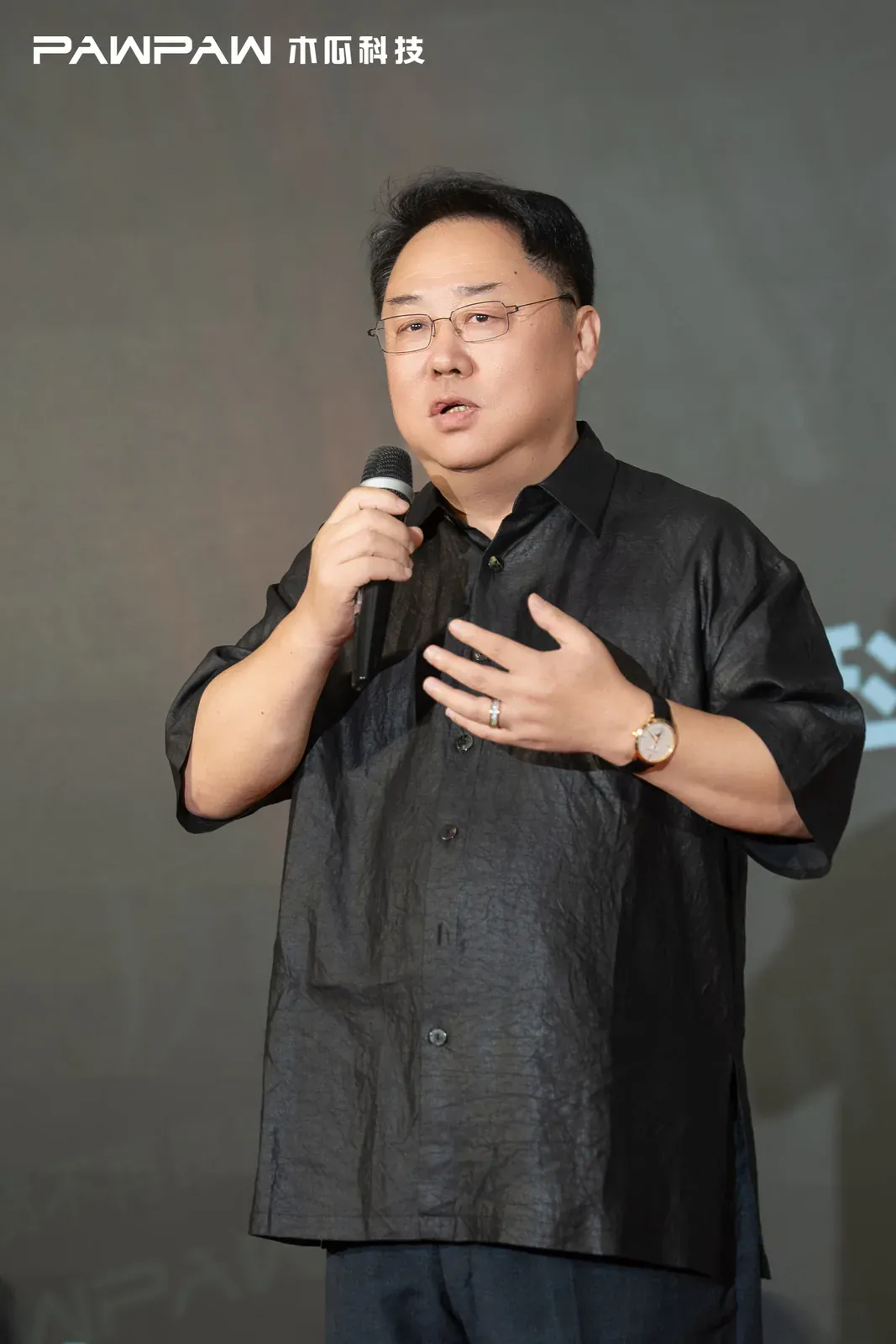 An industry guest delivering anniversary remarks
