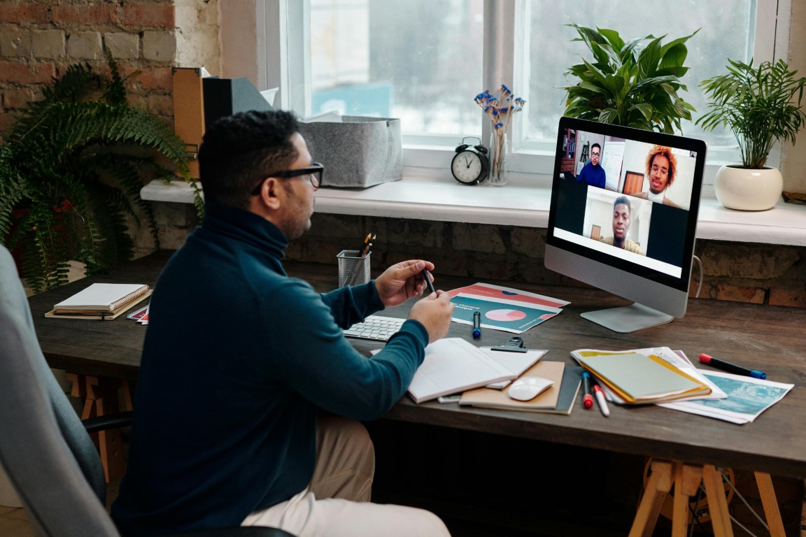 Person at desk having a video conference call